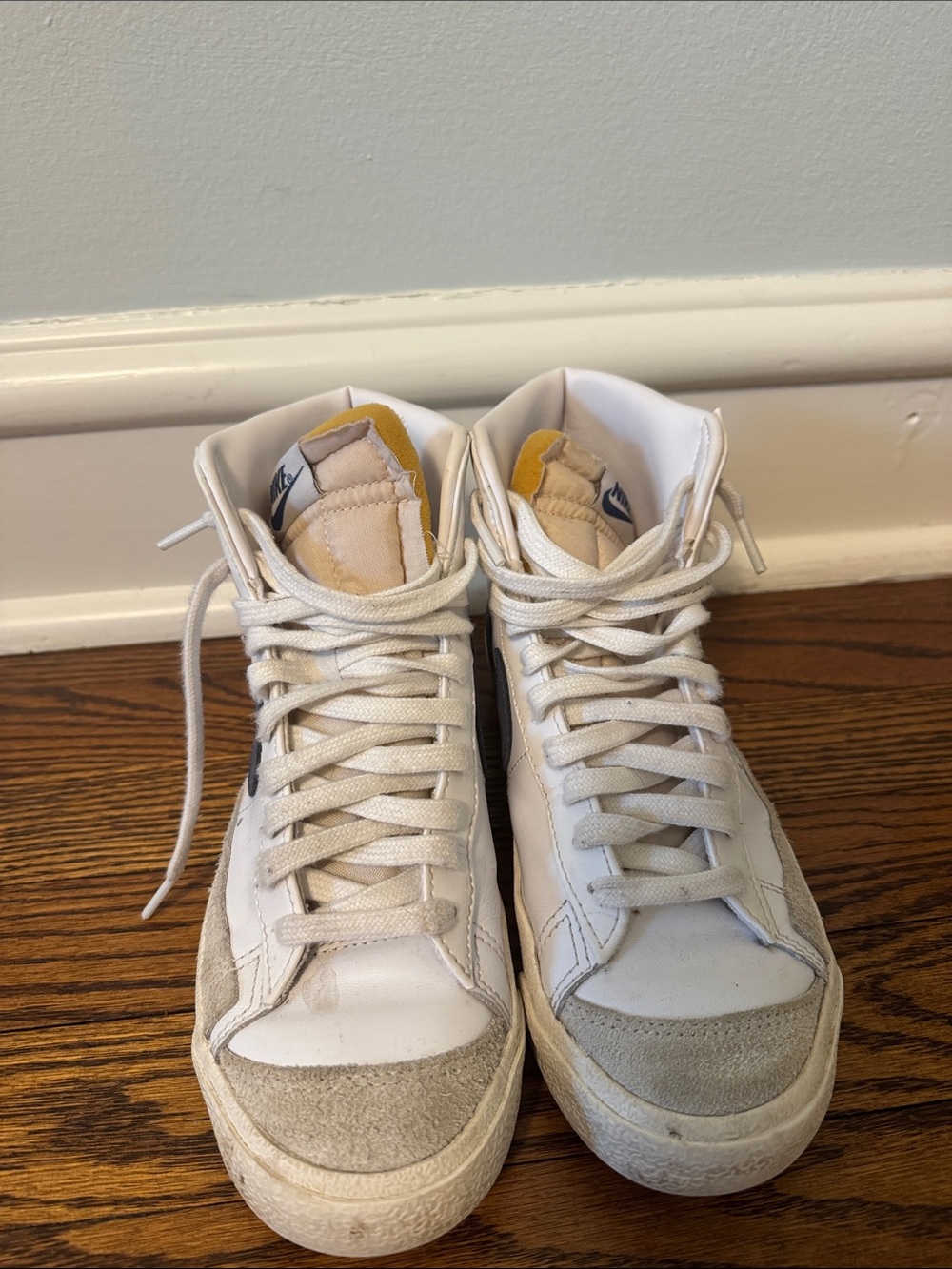 Women’s White High-Top Nike Sneakers